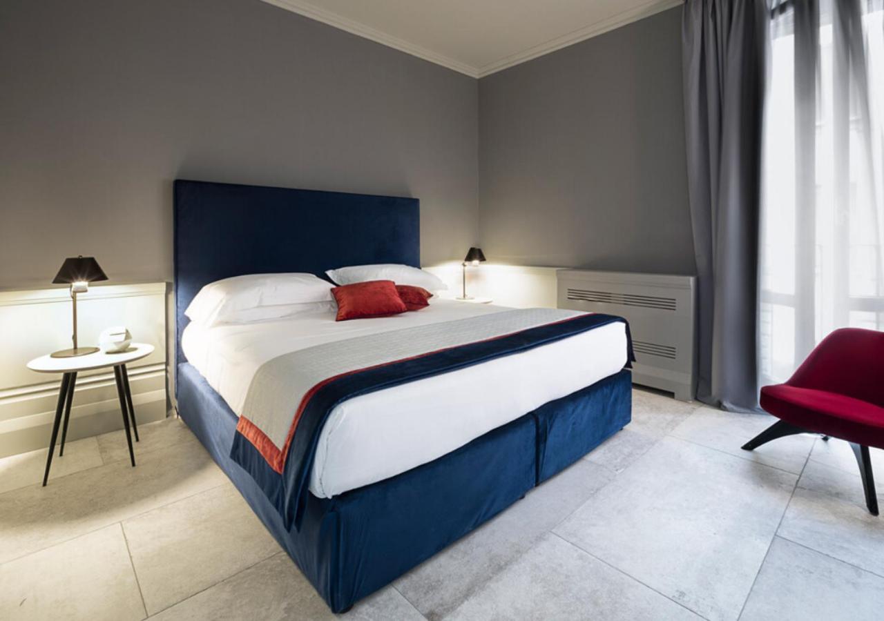 Hotel Palazzo Cornalia Milán Exteriér fotografie A bedroom at the hotel